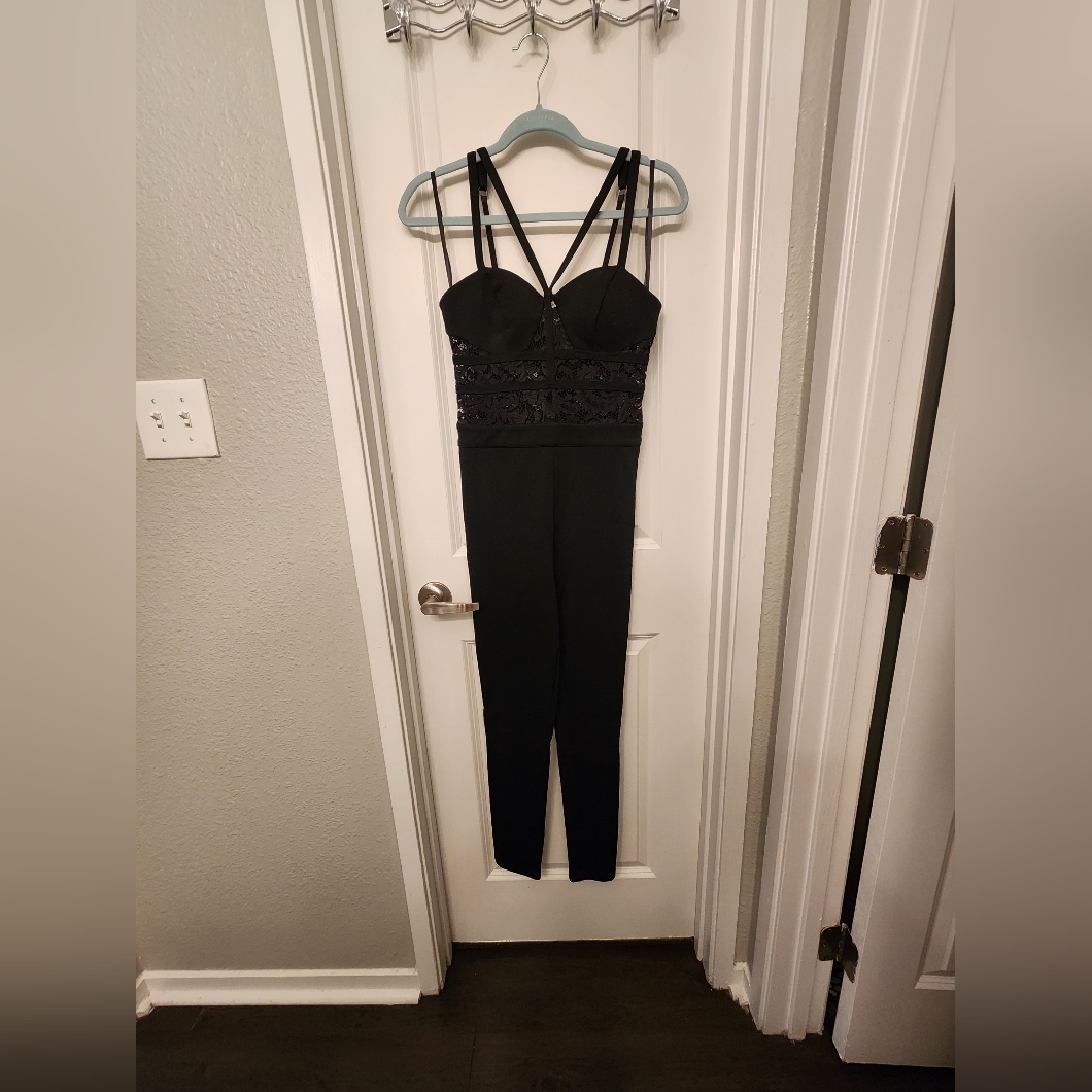Black Bebe Jumpsuit With Lace Inserts. Size Xs